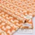 Beige/Orange Pattern